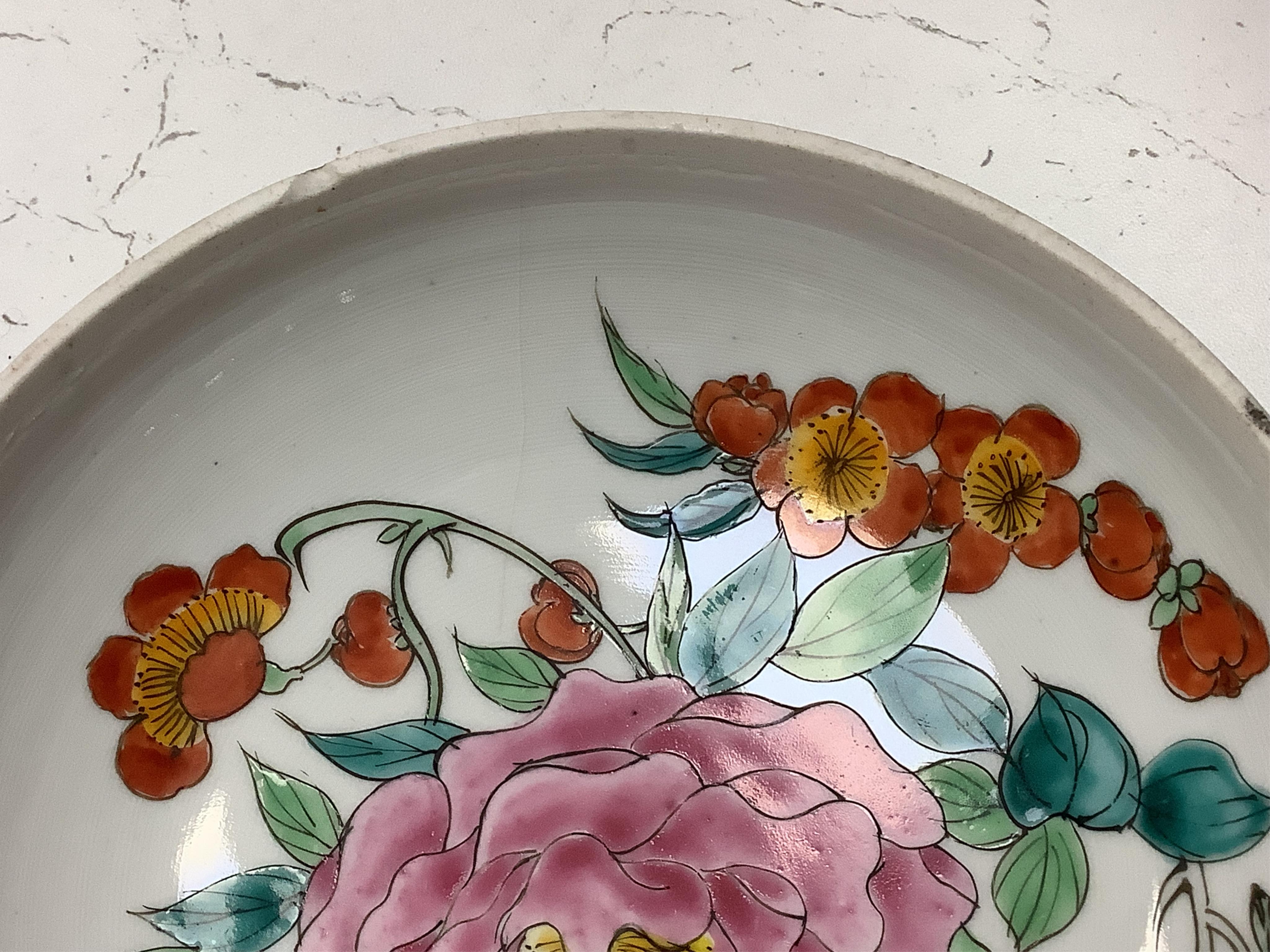 A Chinese celadon and blue and white vase, a dish decorated with birds and flowers and a pot and cover, largest 23cm in diameter